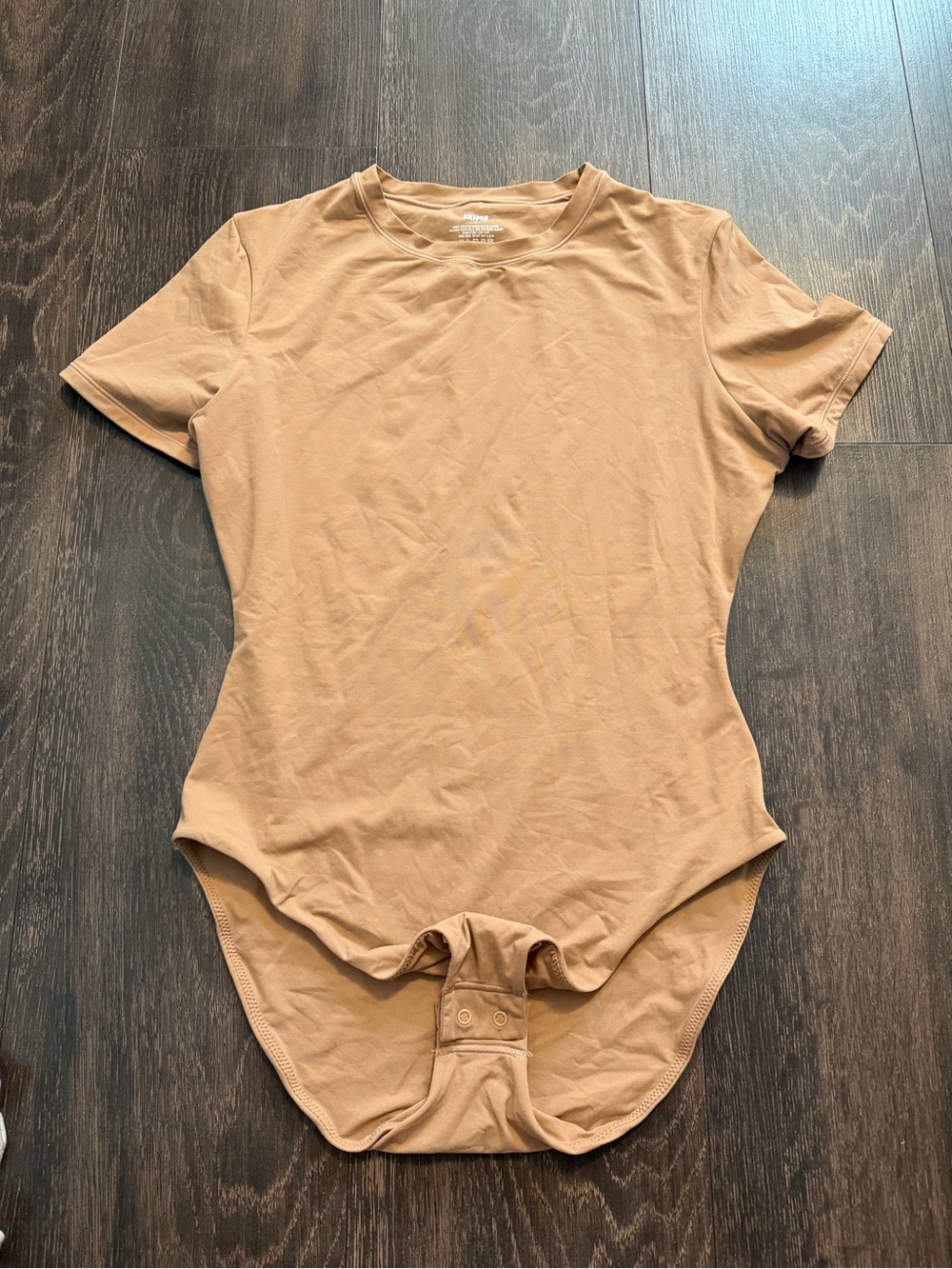 SKIMS Short Sleeve Bodysuit in Nude Tan